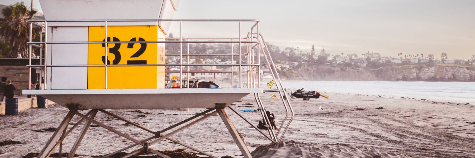 A lifeguard pier on the beach.
