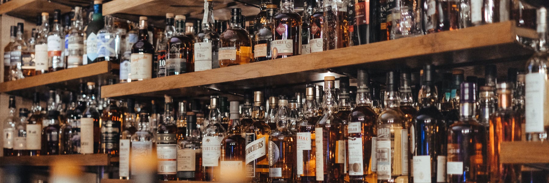 A bar stocked with whiskey.